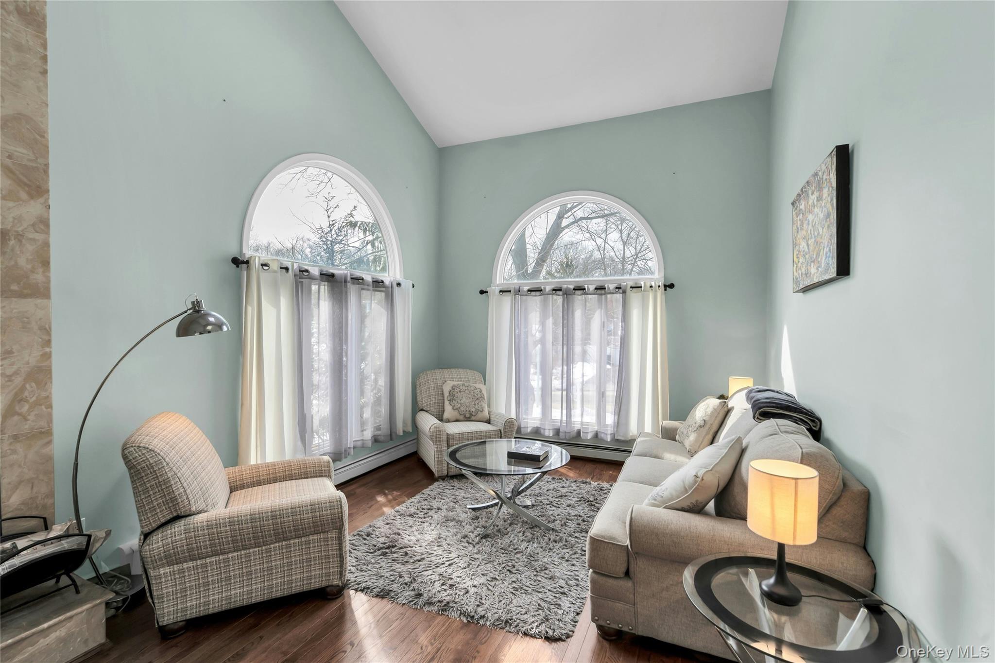 54 Valleywood Road Commack, NY 11725 - Photo 12 of 33 a living room with furniture and a large window