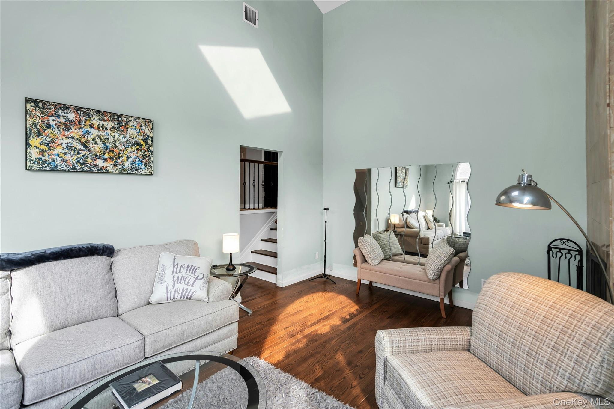 54 Valleywood Road Commack, NY 11725 - Photo 13 of 33 a living room with furniture and a couch