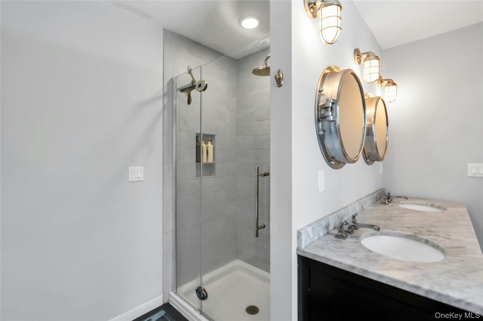 54 Valleywood Road Commack, NY 11725 - Photo 28 of 33 a bathroom with a granite countertop sink and a mirror