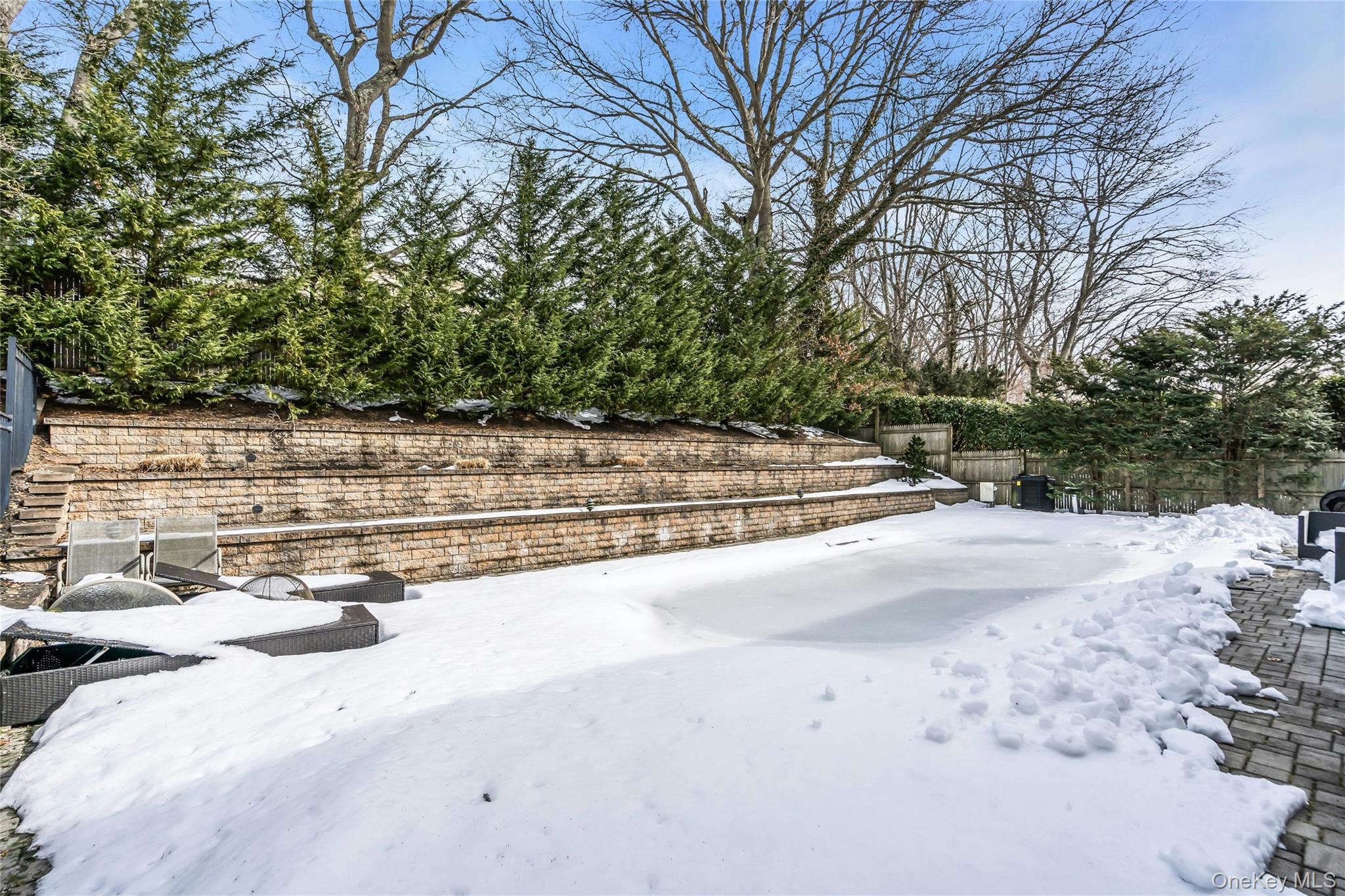 54 Valleywood Road Commack, NY 11725 - Photo 31 of 33 a view of a road with a yard