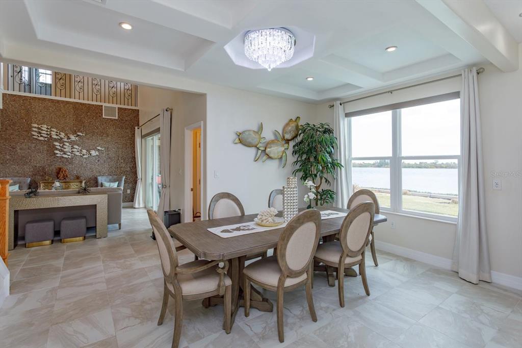 1201 South Riverside Drive Edgewater, FL 32132 - Photo 11 of 47 a view of a dining room with furniture window and outside view