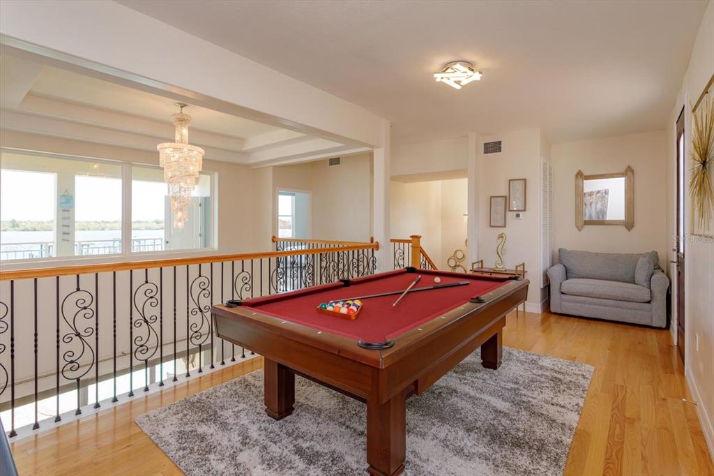 1201 South Riverside Drive Edgewater, FL 32132 - Photo 23 of 47 a living room with furniture a table and a large window