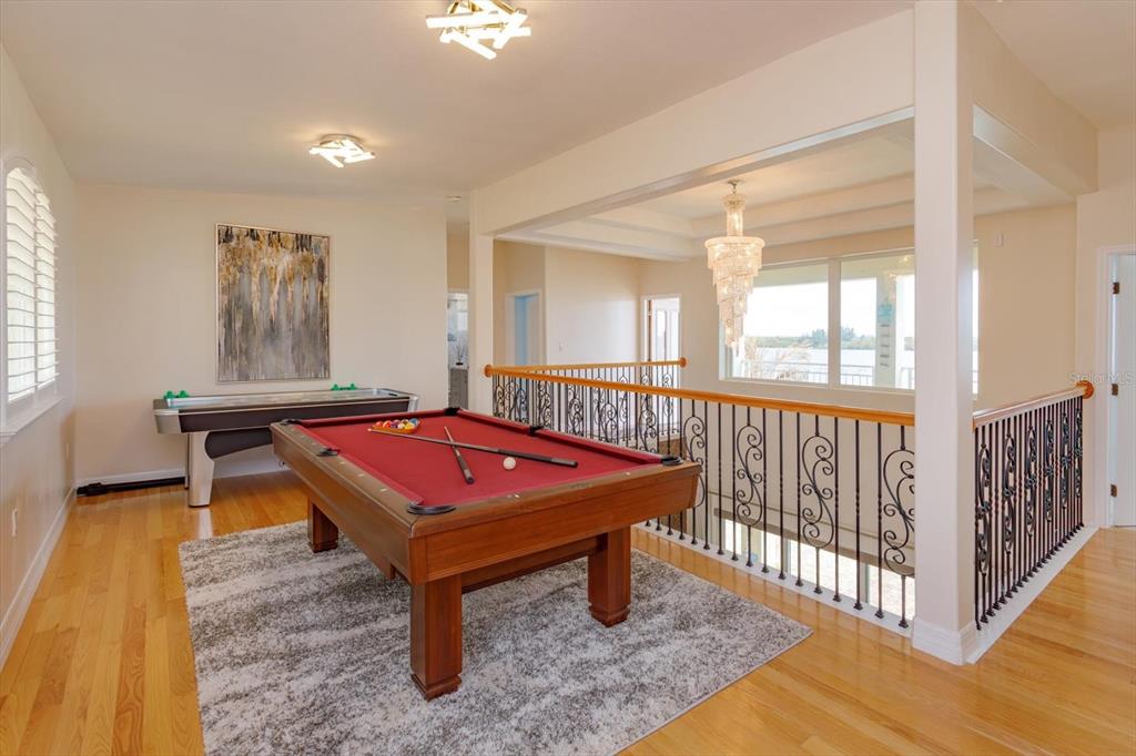 1201 South Riverside Drive Edgewater, FL 32132 - Photo 24 of 47 a room with pool table and windows