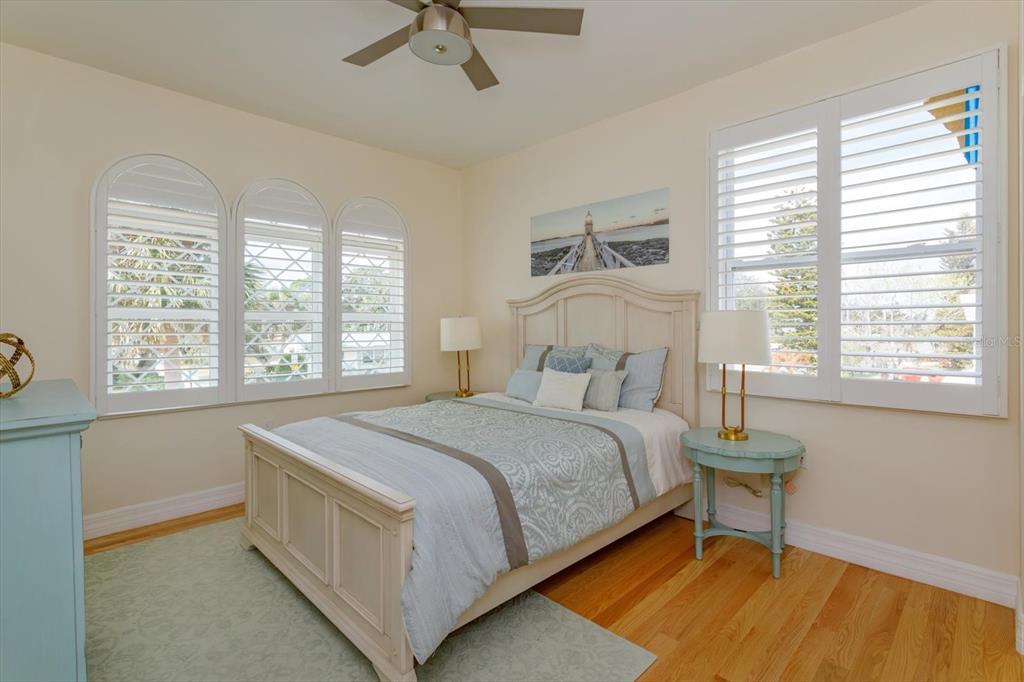 1201 South Riverside Drive Edgewater, FL 32132 - Photo 27 of 47 a bedroom with a bed and a window