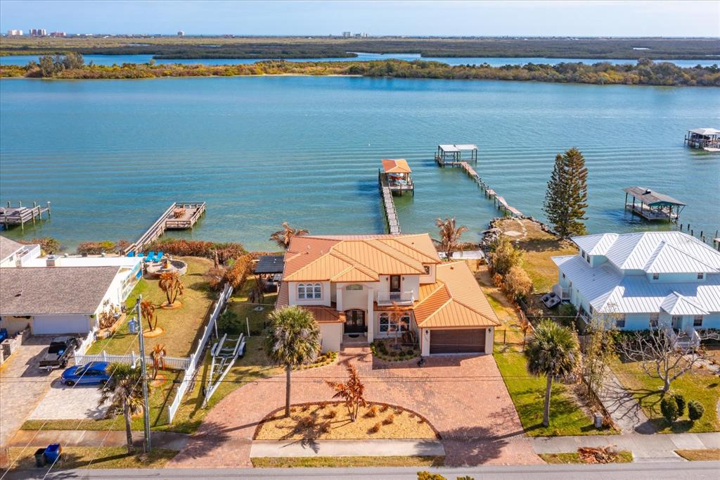 1201 South Riverside Drive Edgewater, FL 32132 - Photo 3 of 47 an aerial view of a house with a lake view