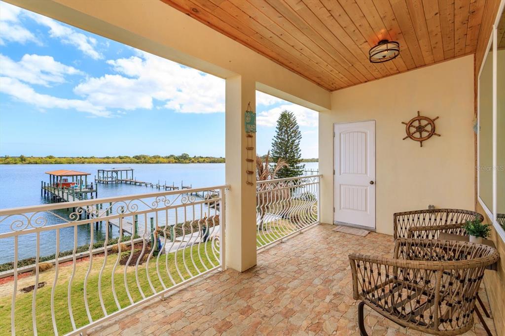 1201 South Riverside Drive Edgewater, FL 32132 - Photo 32 of 47 a balcony with furniture and city view