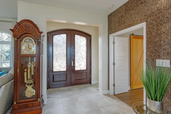 a view of front door with hallway