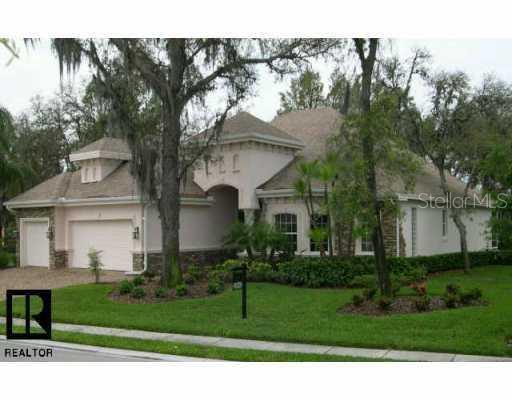 1640 Parilla Circle New Port Richey, FL 34655 - Photo 1 of 1 a front view of a house with a yard