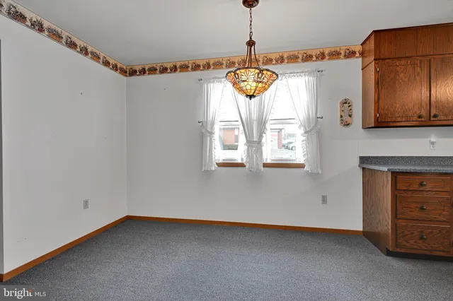 a very nice looking room with a chandelier