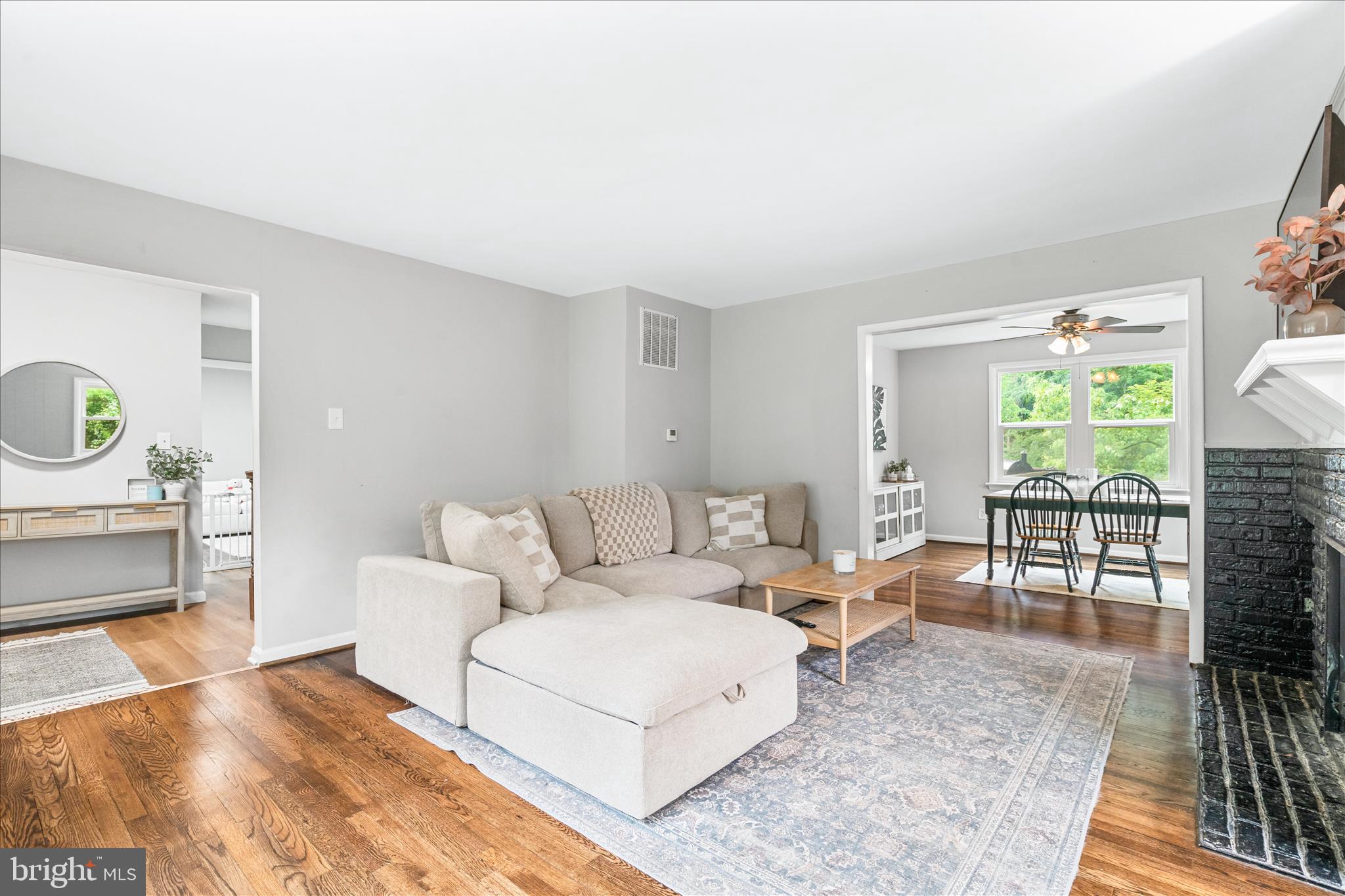 4217 Bill Moxley Road Mount Airy, MD 21771 - Photo 11 of 57 a living room with furniture and a table