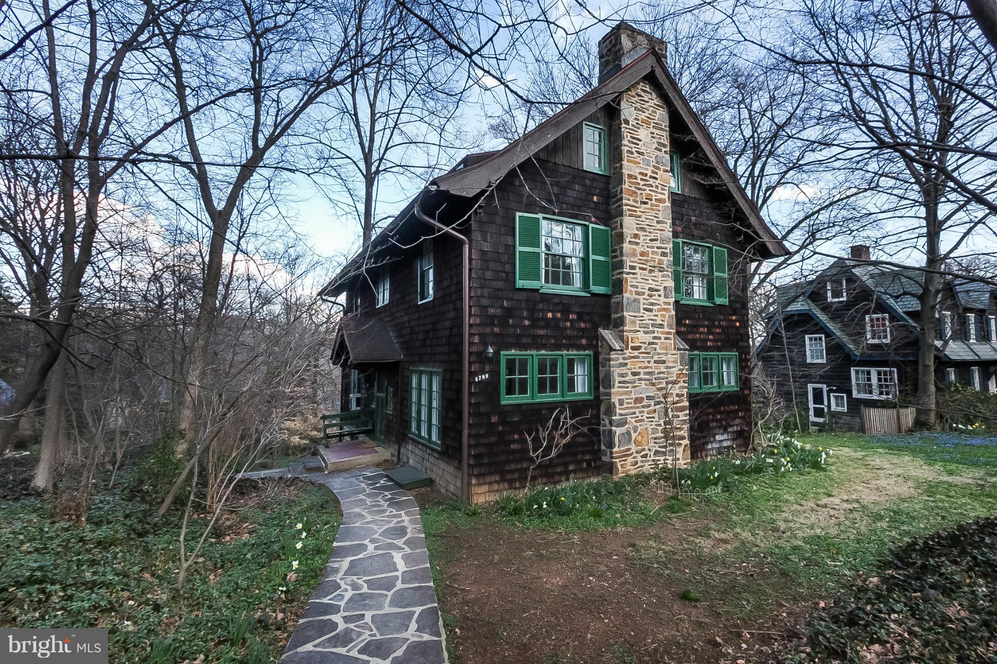 4709 Keswick Road Baltimore, MD 21210 - Photo 2 of 30 a front view of a house with garden
