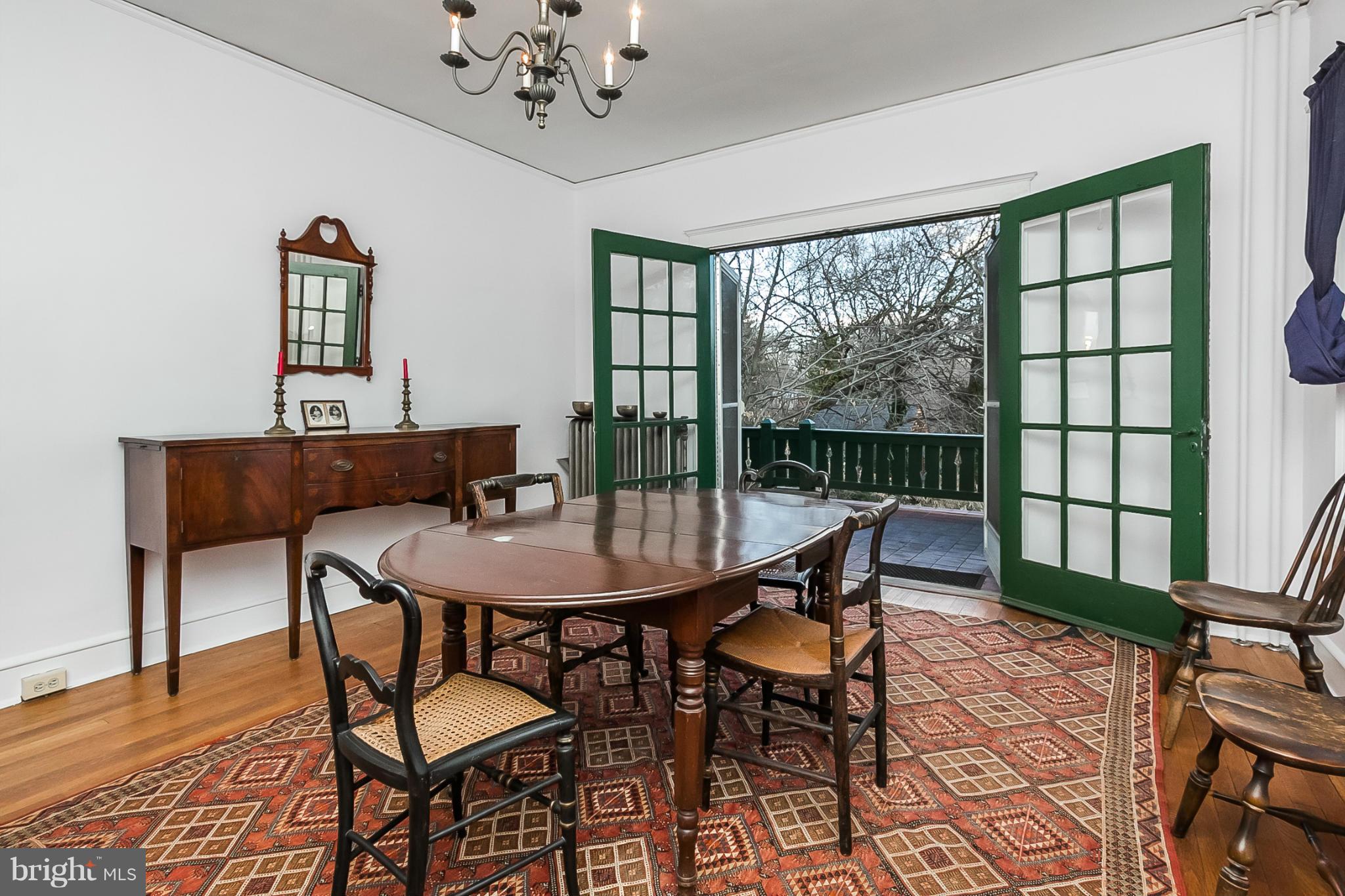 4709 Keswick Road Baltimore, MD 21210 - Photo 11 of 30 a view of a dining room with furniture window and wooden floor