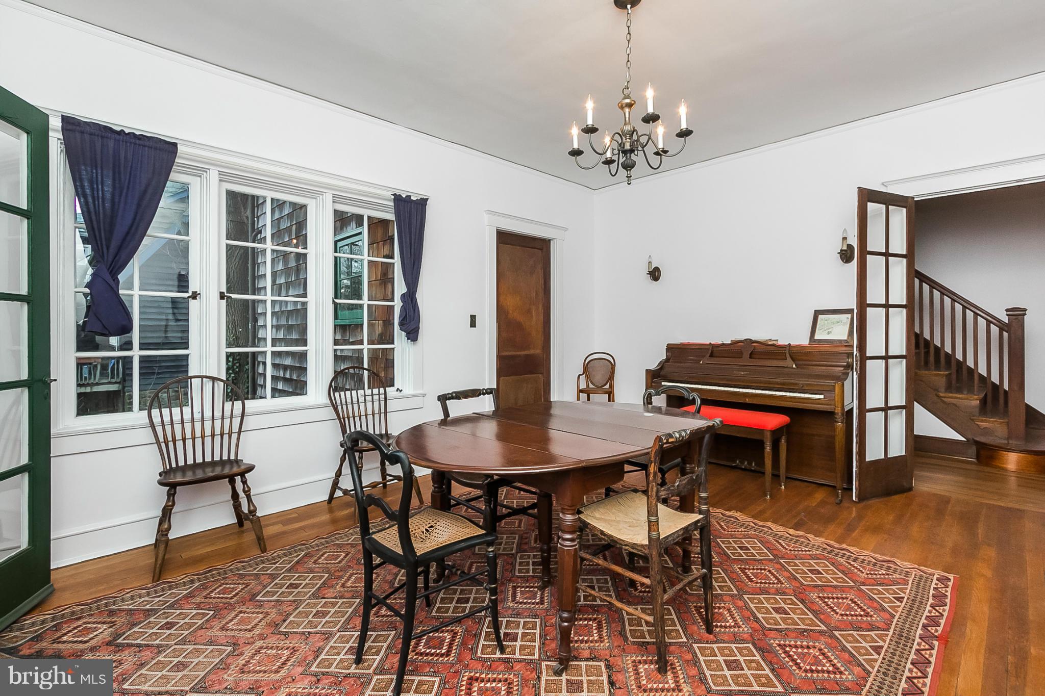 4709 Keswick Road Baltimore, MD 21210 - Photo 12 of 30 a dining room with furniture and wooden floor