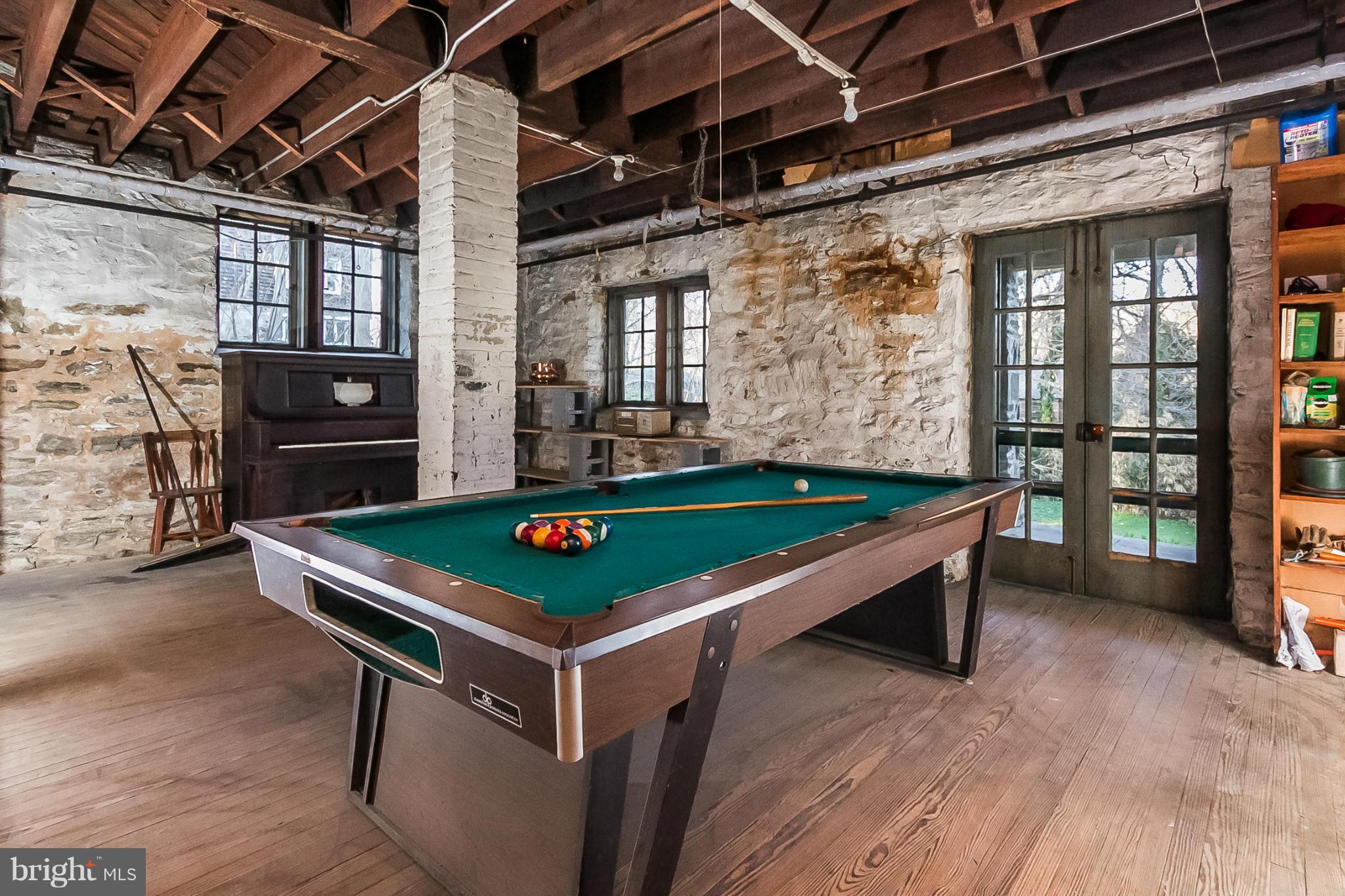 4709 Keswick Road Baltimore, MD 21210 - Photo 27 of 30 a room with pool table and windows