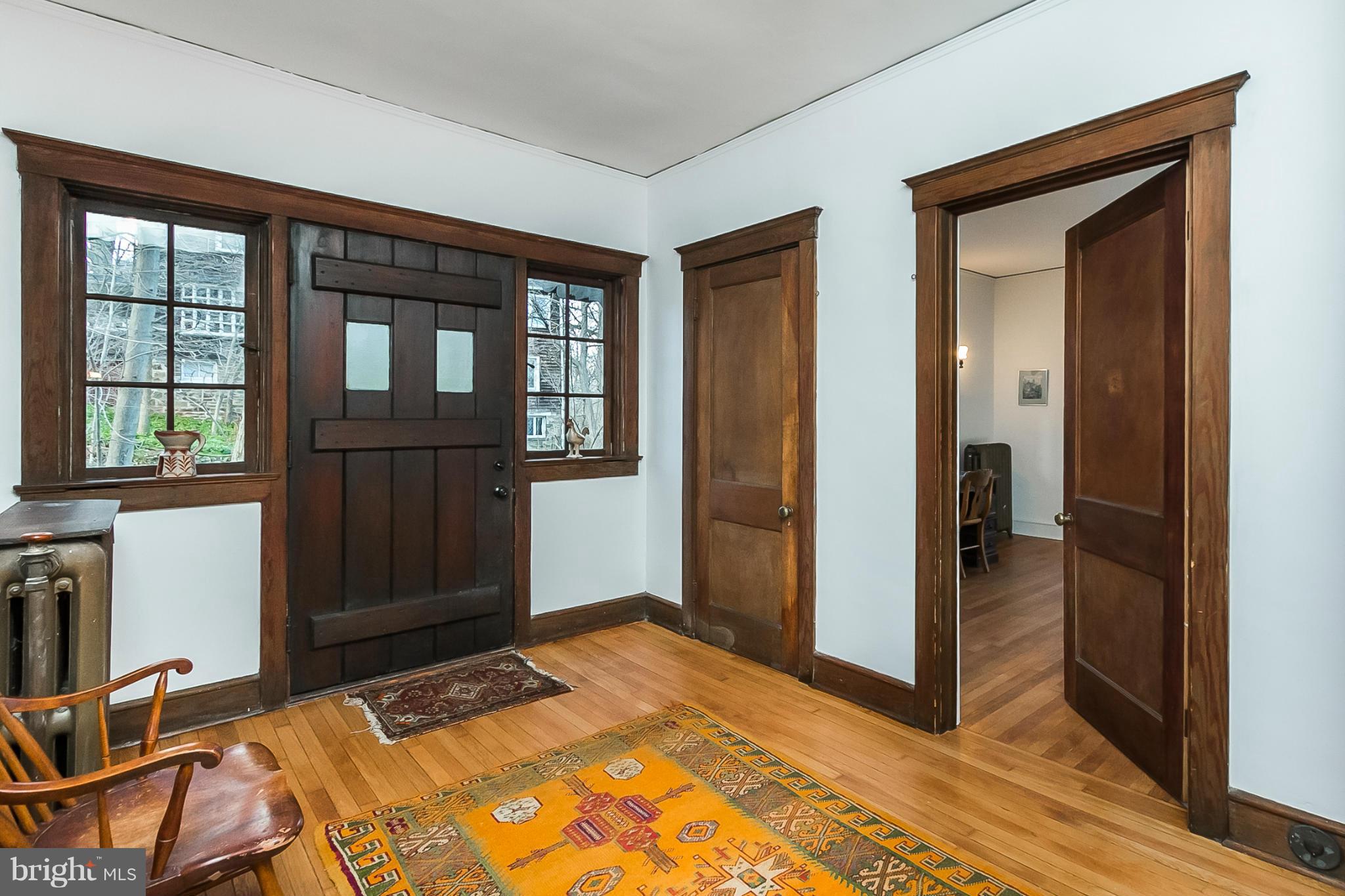 4709 Keswick Road Baltimore, MD 21210 - Photo 5 of 30 a bedroom with a bed and wooden floor
