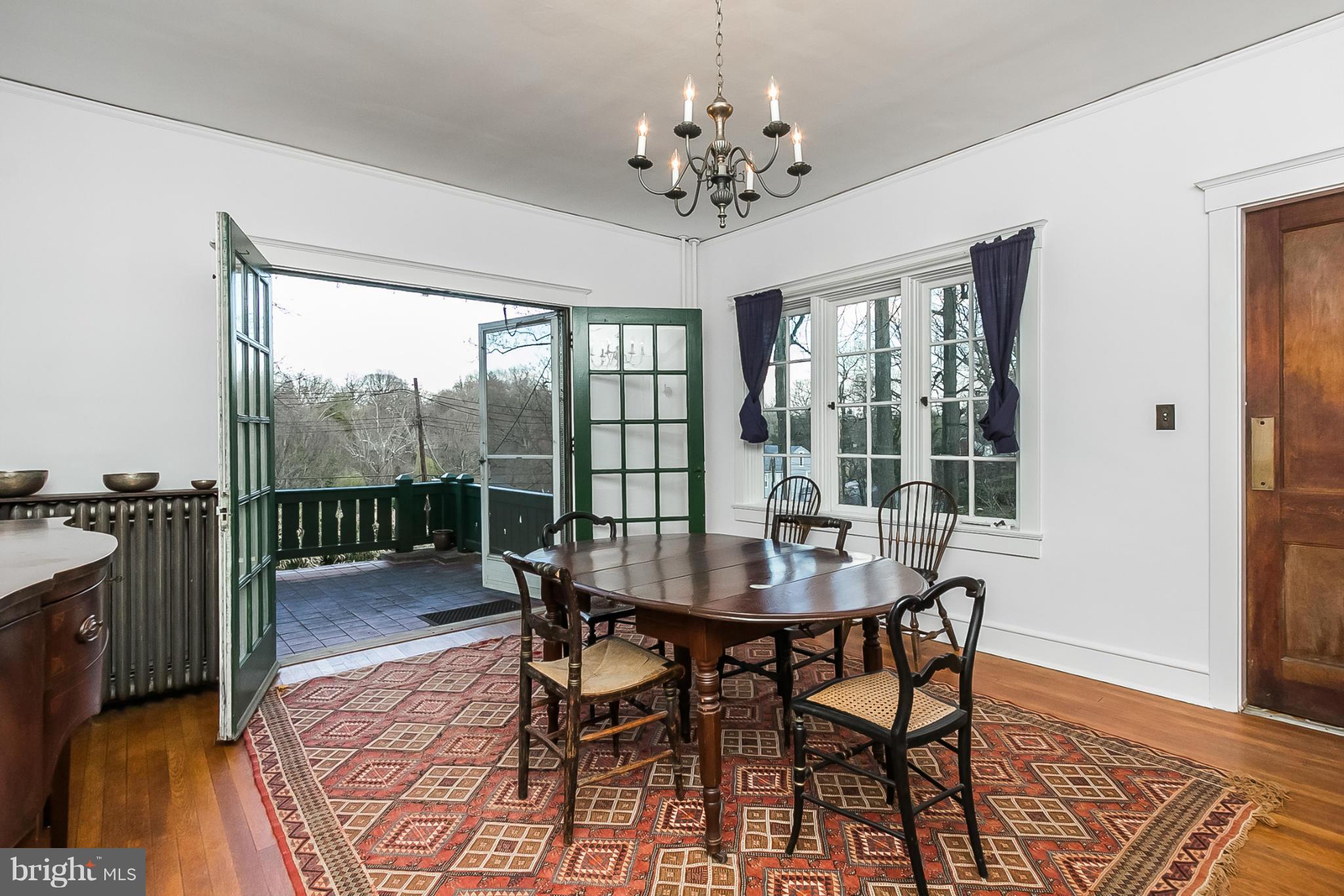 4709 Keswick Road Baltimore, MD 21210 - Photo 9 of 30 a dining room with furniture window and wooden floor