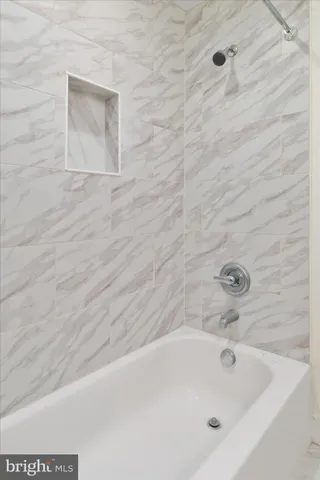 a bathroom with a bathtub