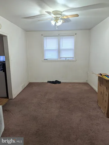 a view of a livingroom with a window