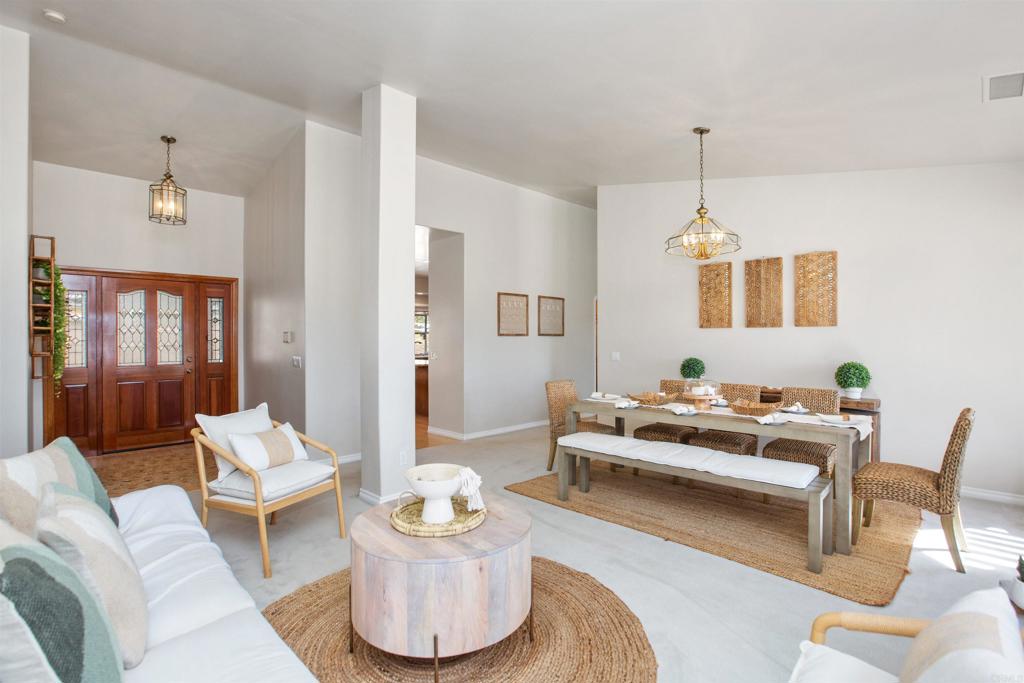 29076 Sunset Road Valley Center, CA 92082 - Photo 16 of 65 a living room with furniture and wooden floor
