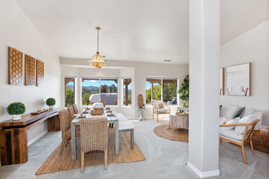 29076 Sunset Road Valley Center, CA 92082 - Photo 17 of 65 a view of a dining room with furniture window and outside view