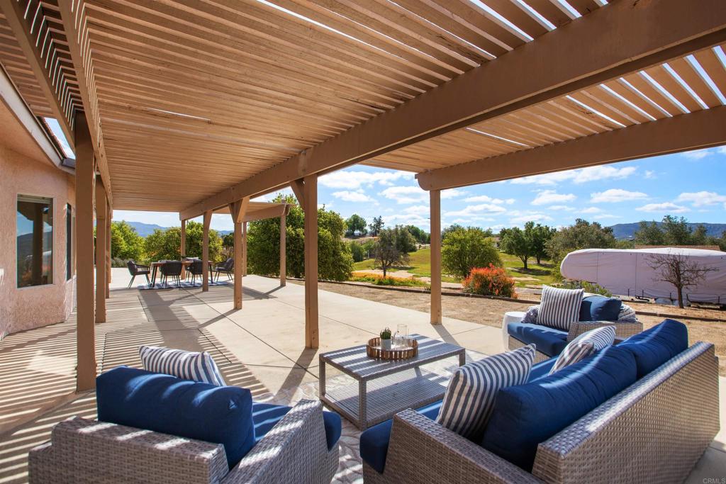 29076 Sunset Road Valley Center, CA 92082 - Photo 43 of 65 a outdoor space with patio lots of furniture