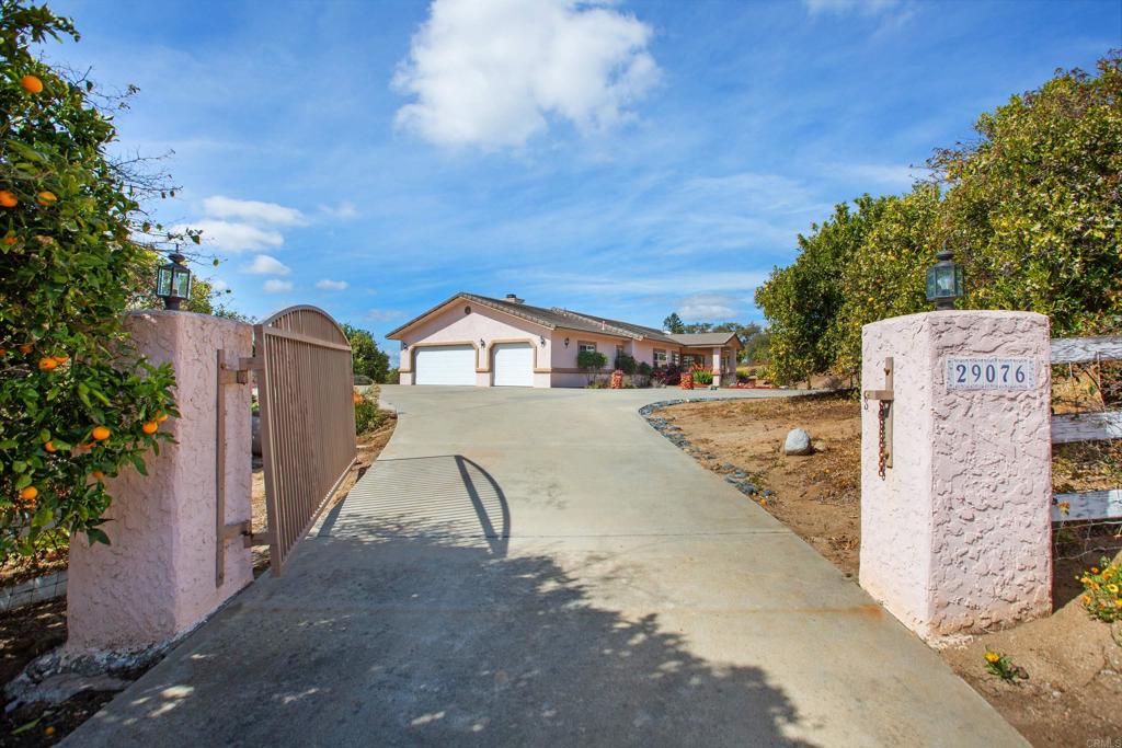 29076 Sunset Road Valley Center, CA 92082 - Photo 57 of 65 a view of residential houses with outdoor space