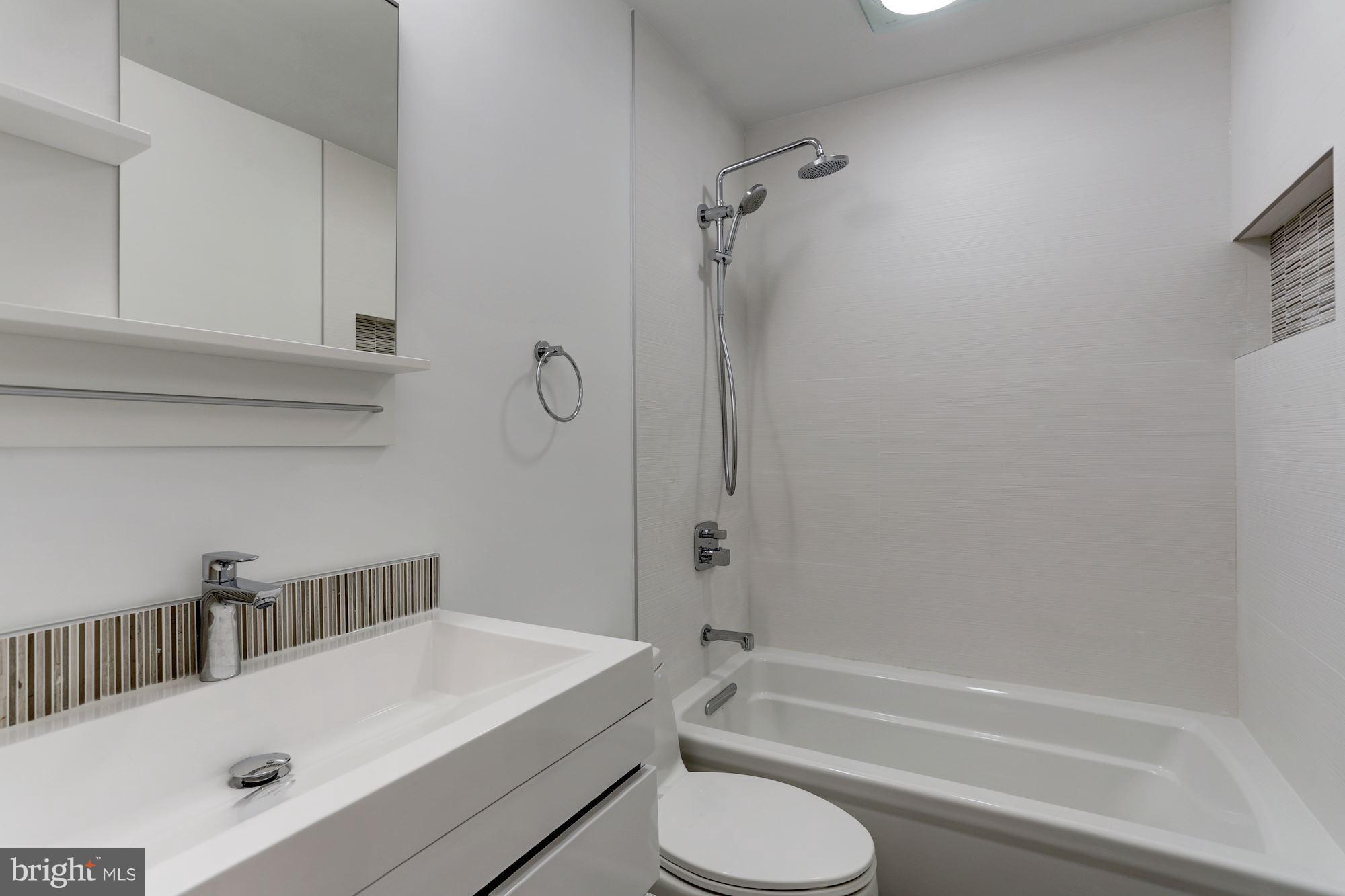 1325 13th Street Northwest, Unit 24 Washington, DC 20005 - Photo 18 of 30 a bathroom with a sink and a toilet