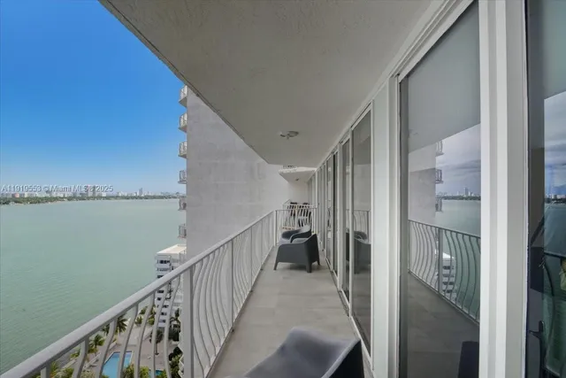 a view of a balcony with an outdoor space