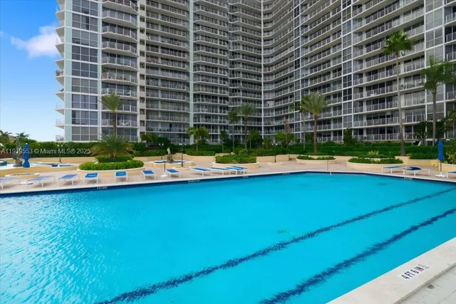 an aerial view of a house with outdoor space
