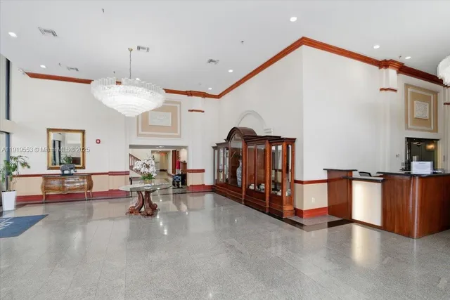 a large kitchen with windows and a table