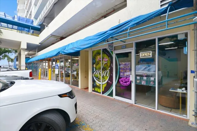 a view of swimming pool with chairs