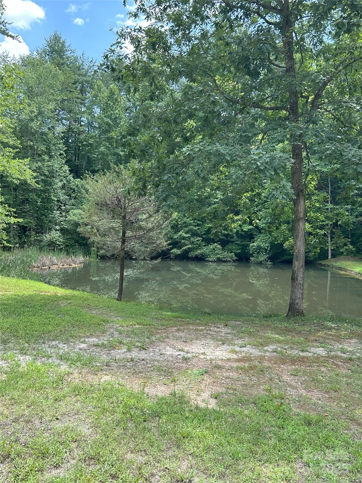 0 Poplar Ridge Lane Morganton, NC 28655 - Photo 12 of 20 a view of a lake with a yard