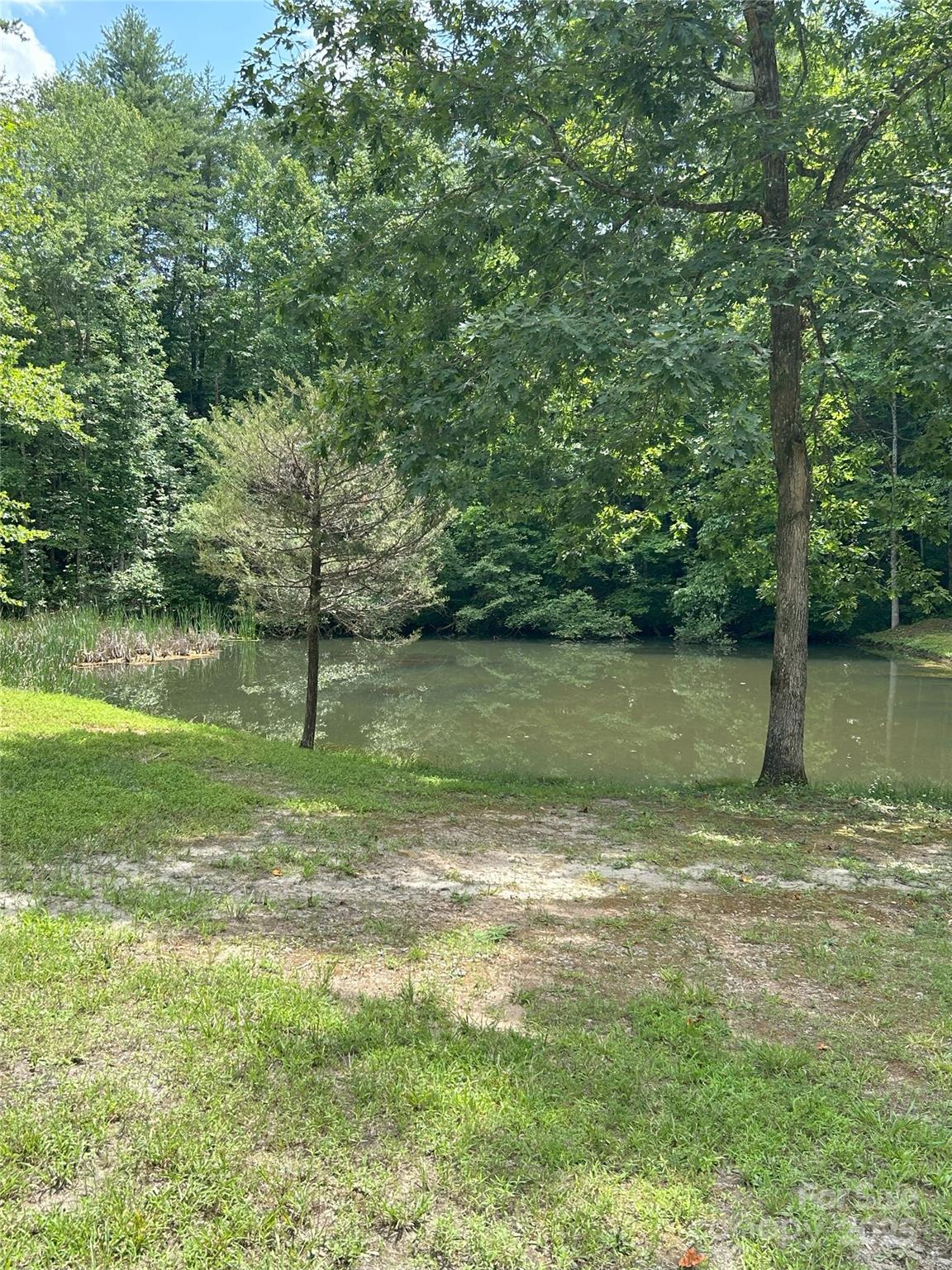 0 Poplar Ridge Lane Morganton, NC 28655 - Photo 14 of 20 a view of a lake with a yard