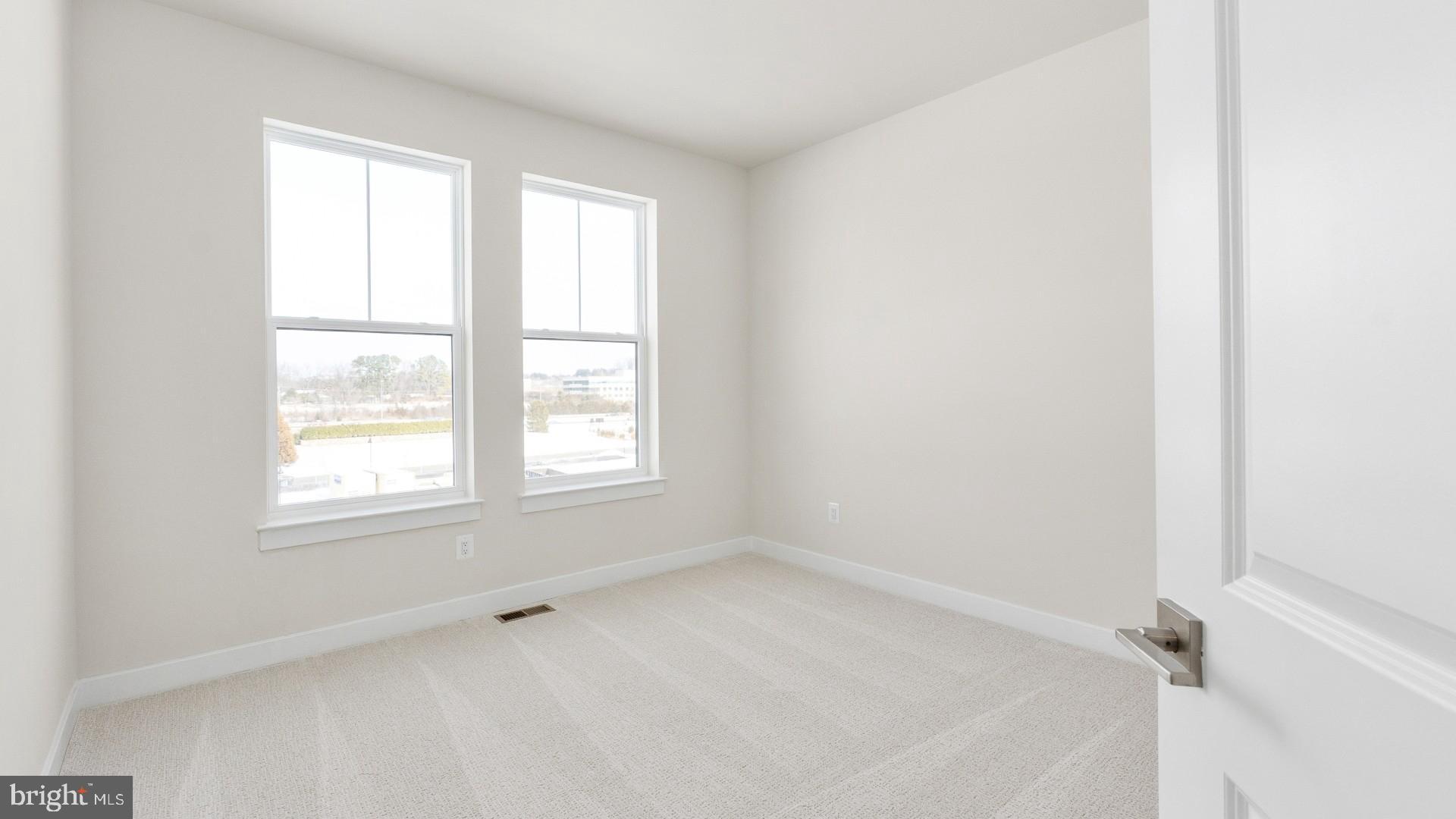 44588 Strabane Terrace Ashburn, VA 20147 - Photo 20 of 26 an empty room with a window