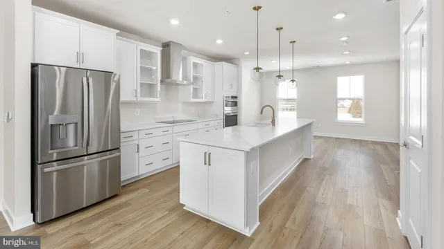 a view of staircase with white walls