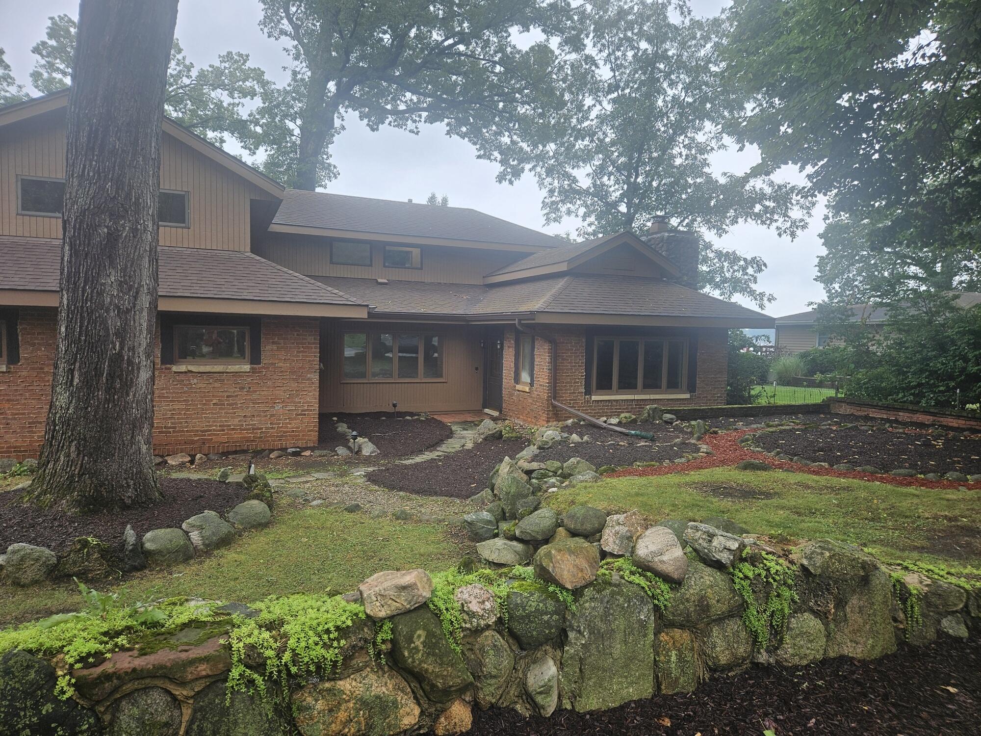 683 Waverly Road La Porte, IN 46350 - Photo 13 of 54 a front view of a house with garden