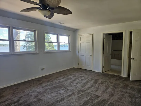 a view of a lake from a yard