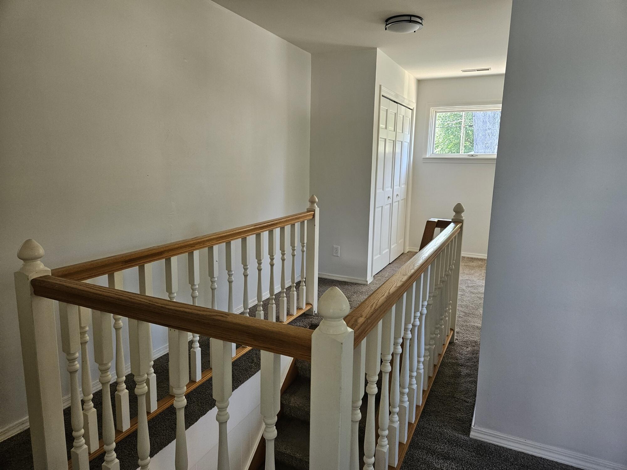 683 Waverly Road La Porte, IN 46350 - Photo 32 of 54 a view of staircase with railing and white walls