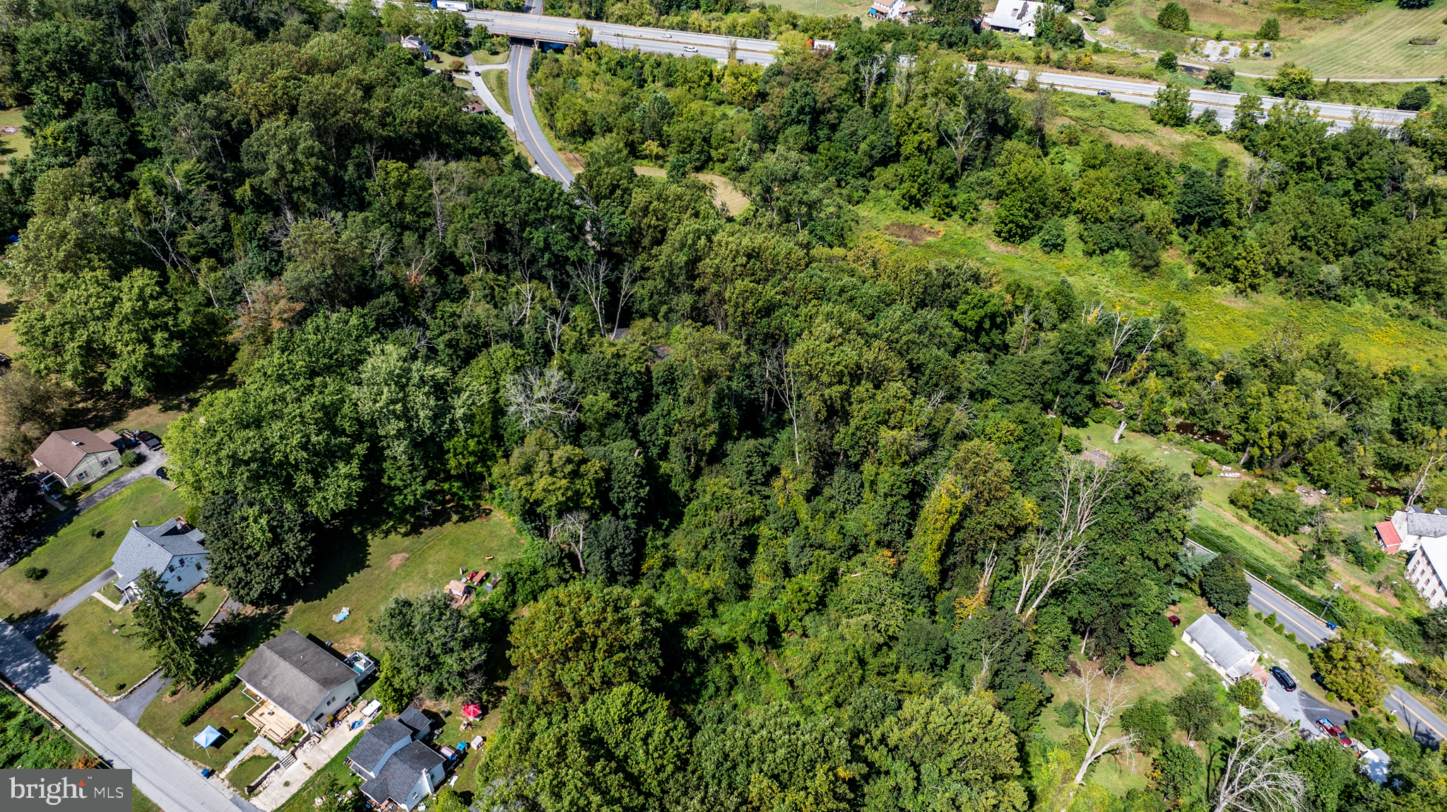 717 Wagontown Road Coatesville, PA 19320 - Photo 9 of 20 an aerial view of residential house with outdoor space and trees all around