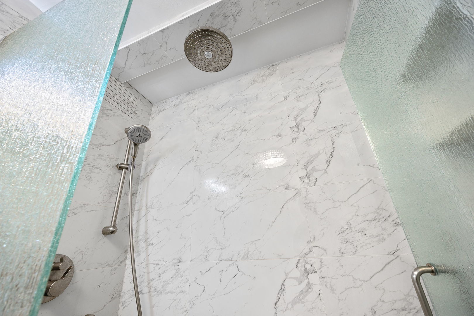 655 West Irving Park Road, Unit 3708 Chicago, IL 60613 - Photo 23 of 55 a bathroom with a shower