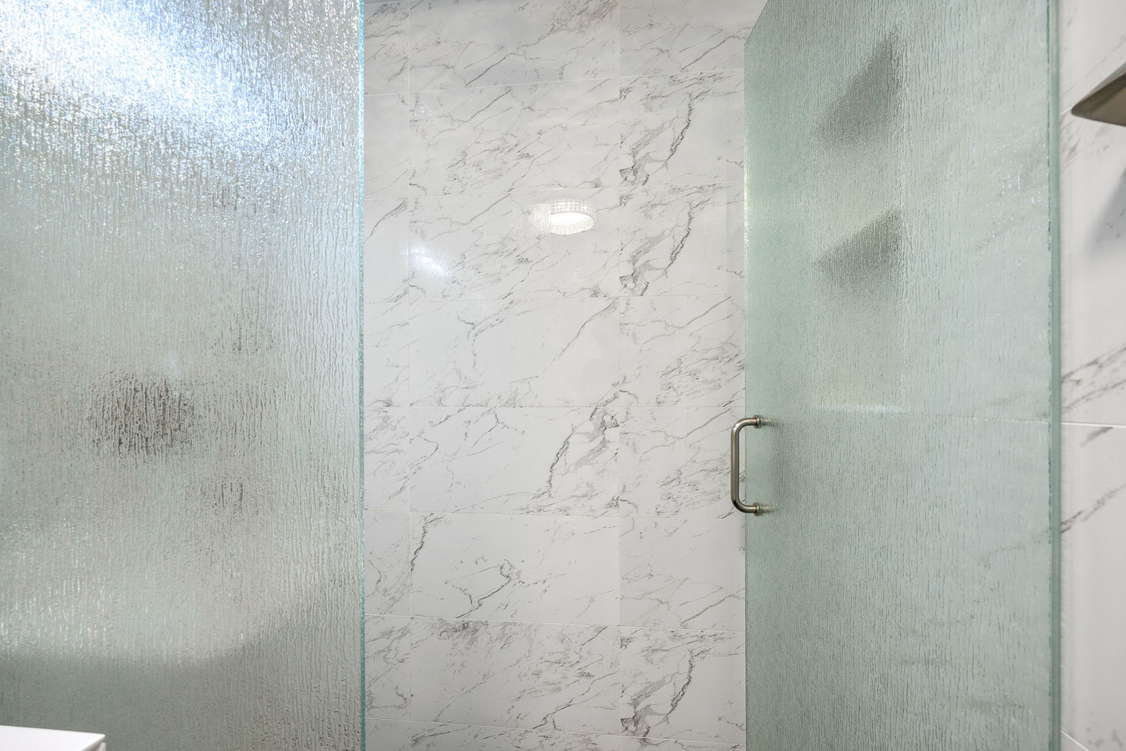 655 West Irving Park Road, Unit 3708 Chicago, IL 60613 - Photo 24 of 55 a bathroom with a shower