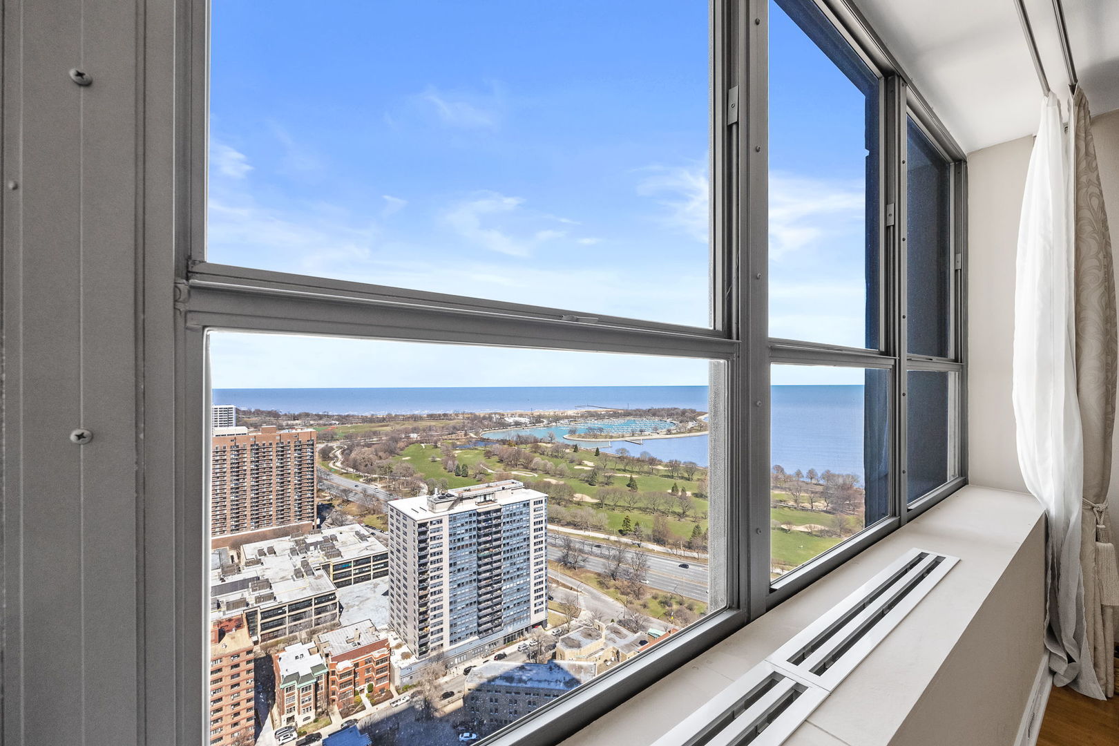 655 West Irving Park Road, Unit 3708 Chicago, IL 60613 - Photo 25 of 55 a view of a balcony with city view