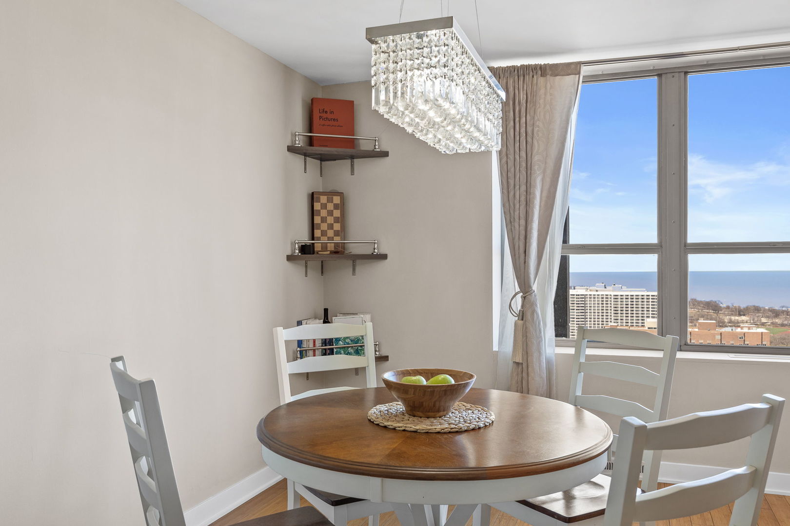 655 West Irving Park Road, Unit 3708 Chicago, IL 60613 - Photo 31 of 55 a dining room with furniture and window