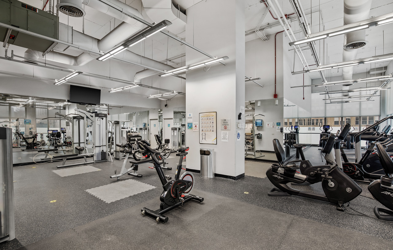 655 West Irving Park Road, Unit 3708 Chicago, IL 60613 - Photo 34 of 55 a view of a room with gym equipment
