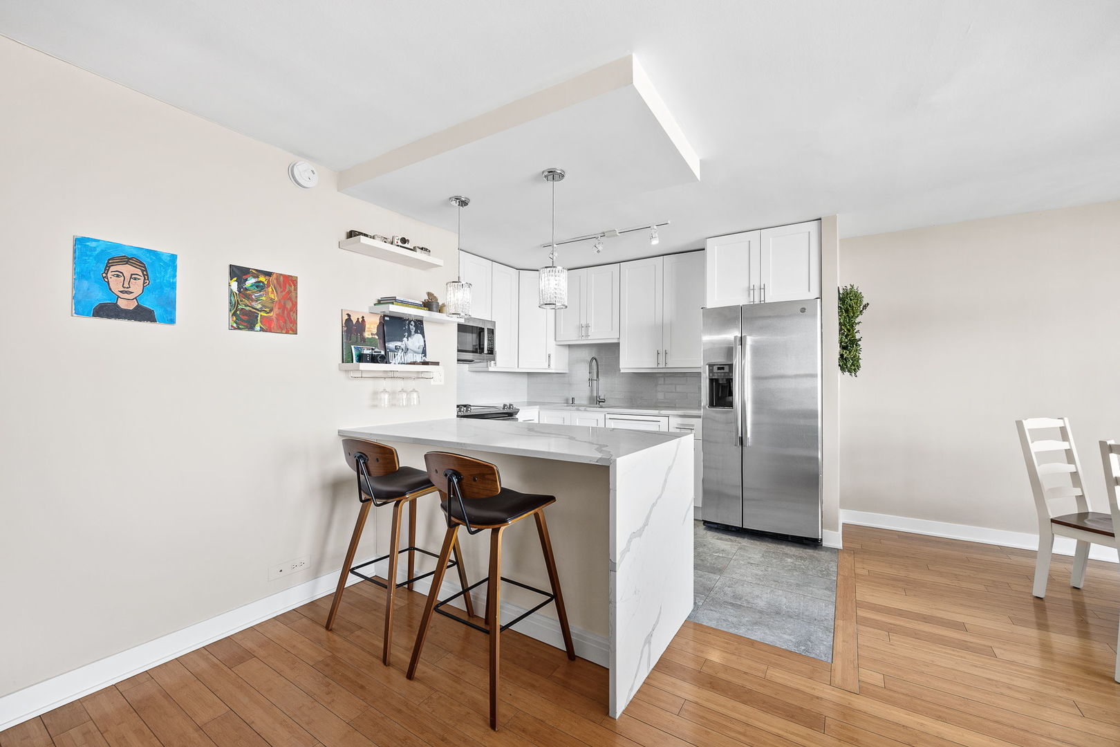 655 West Irving Park Road, Unit 3708 Chicago, IL 60613 - Photo 10 of 55 a kitchen with stainless steel appliances a stove a sink dishwasher and a refrigerator
