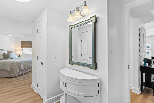 a bedroom with a bed and glass window