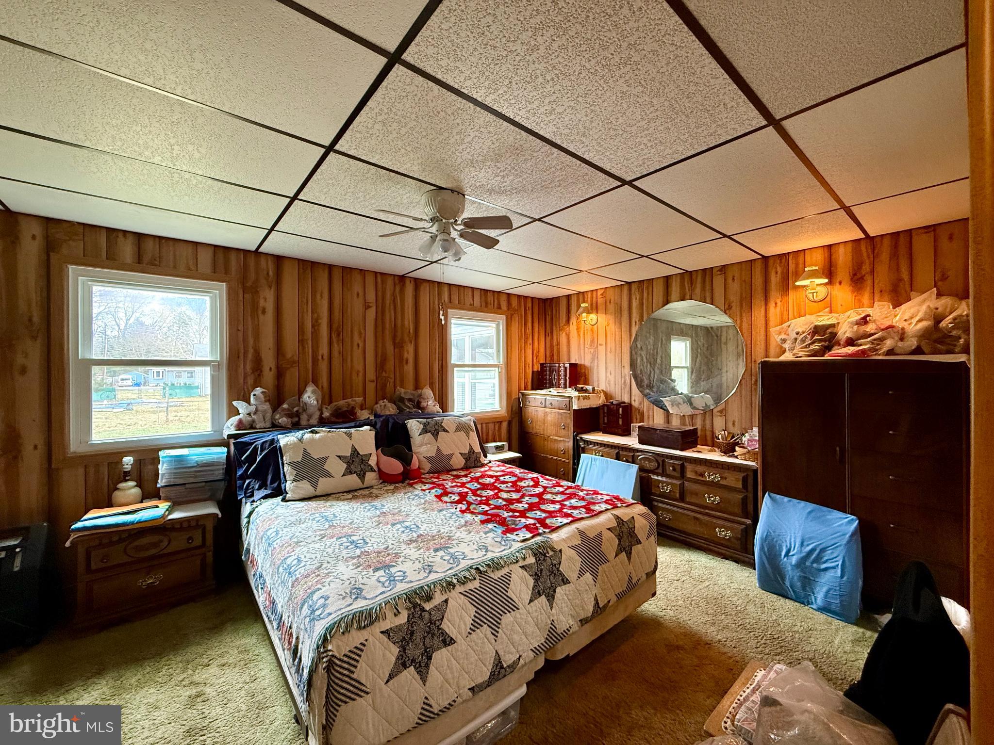 29866 Jefferson Road Mechanicsville, MD 20659 - Photo 36 of 43 Cozy bedroom with rustic wooden accents.