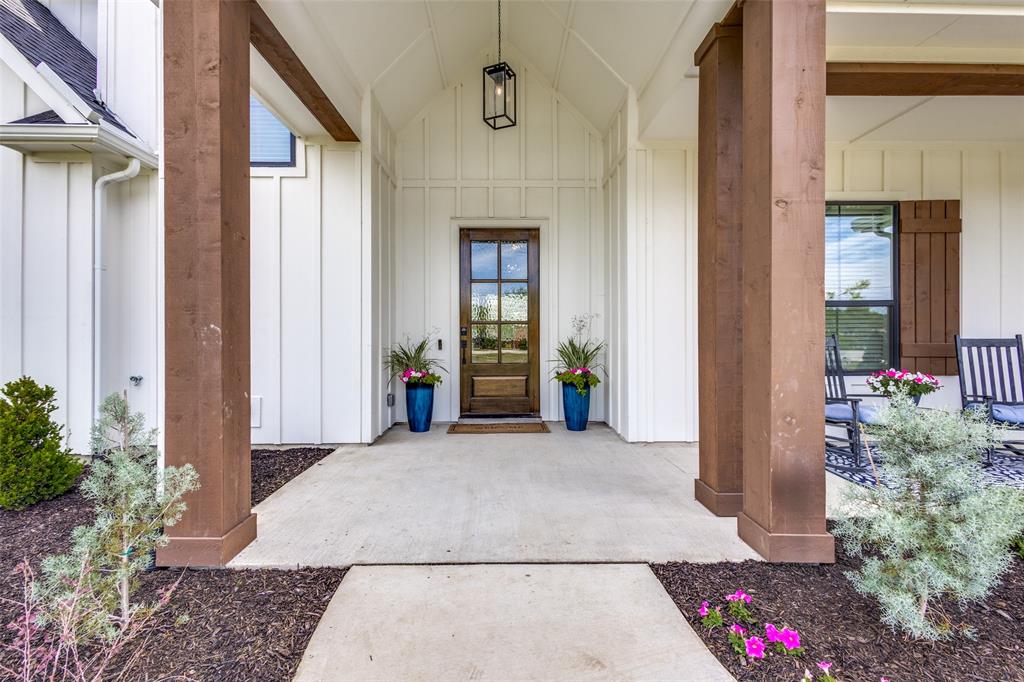 2255 County Road 377 Van Alstyne, TX 75495 - Photo 2 of 35 a front view of a house with a porch