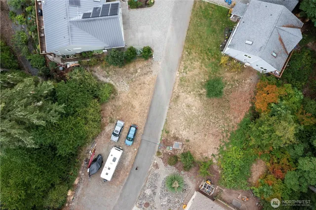 an aerial view of a house with outdoor space
