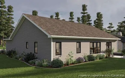 a view of a house with garden and plants